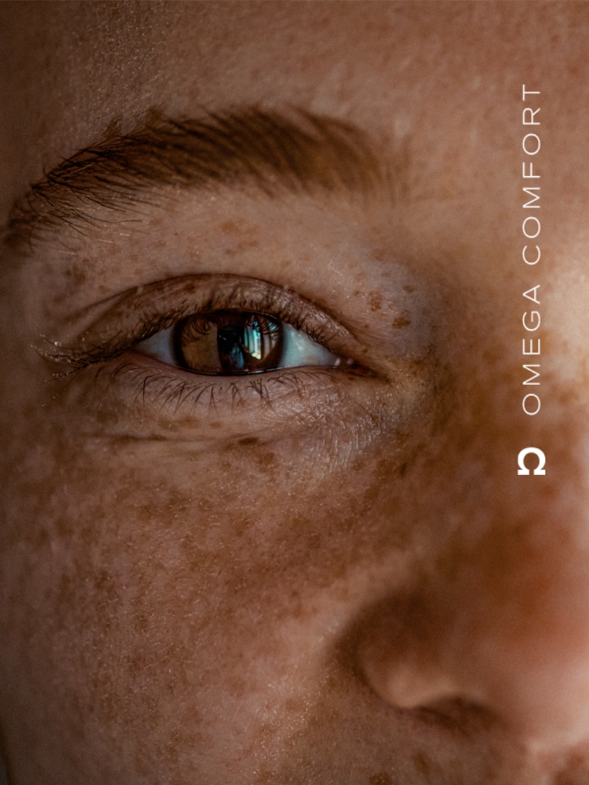 Olho de mulher, com logo do Omega comfort